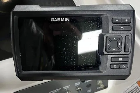 Slide: The Image of Garmin navigation system on 2023 Bayliner Element E18 boat dashboard. - 3