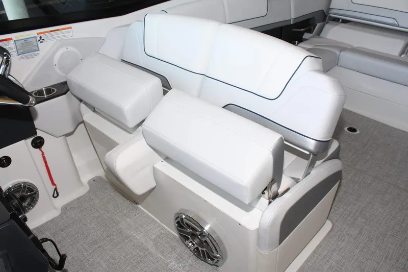 Slide: The Image of 2026 Formula 310 Sun Sport boat interior with white seating and modern design. - 22