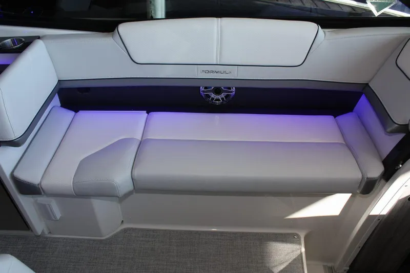 Slide: The Image of Luxurious seating in 2026 Formula 310 Sun Sport boat with ambient lighting. - 27