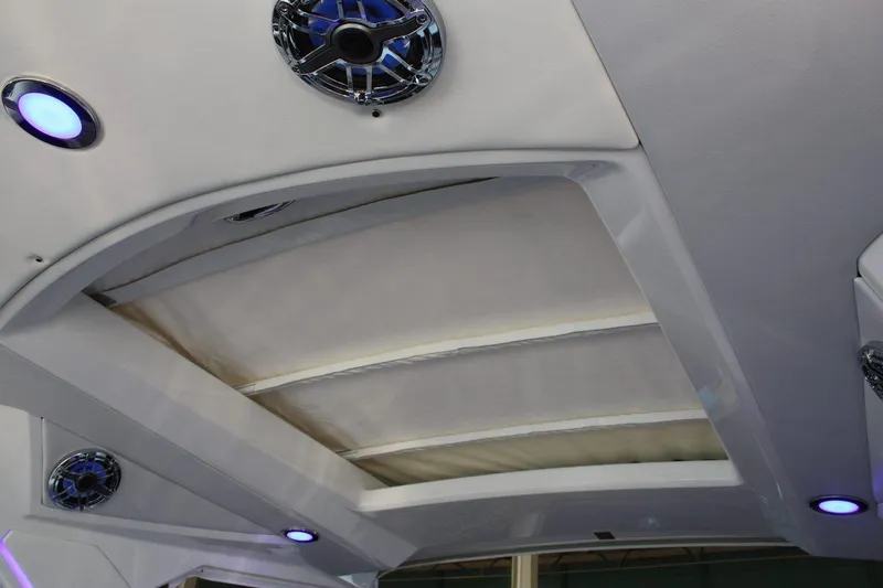 Slide: The Image of 2026 Formula 310 Sun Sport boat interior ceiling with speakers and LED lights. - 31