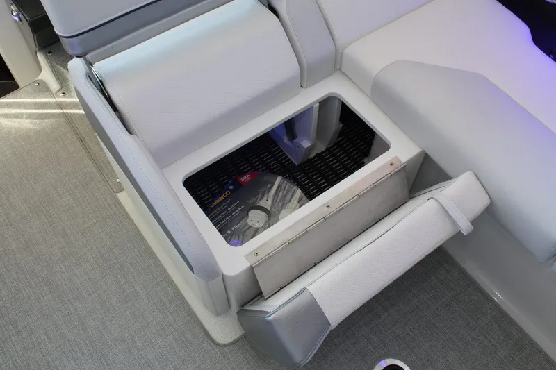 Slide: The Image of 2026 Formula 310 Sun Sport boat interior storage compartment with cushioned seating. - 34