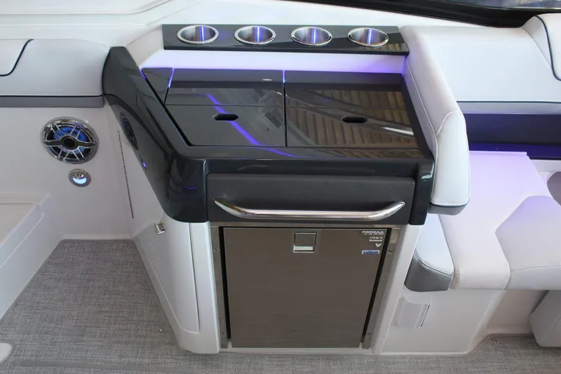 Slide: The Image of 2026 Formula 310 Sun Sport boat interior with sleek kitchenette and modern design. - 36