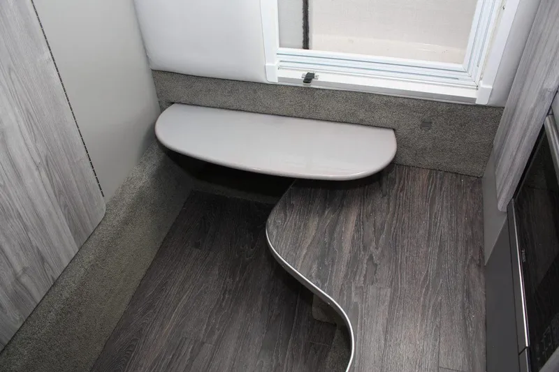 Slide: The Image of Interior of 2026 Formula 310 Sun Sport boat with modern wood flooring and seating. - 48