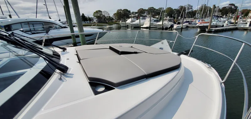 Slide: The Image of Twin Yamaha 300 outboard engines on a 2025 Jeanneau NC 1095 Weekender boat. - 35