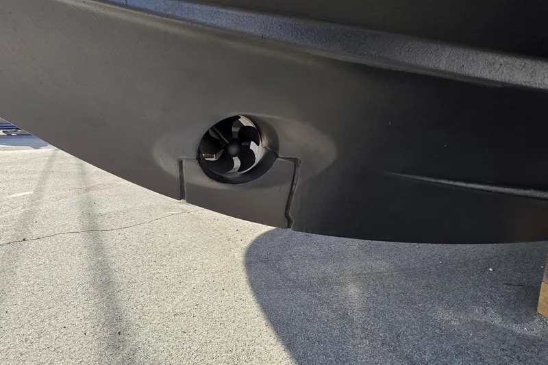 Slide: The Image of 2026 Jeanneau NC 1095 Coupe hull with bow thruster detail. - 76