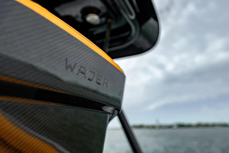 Slide: The Image of Close-up of 2025 Wajer 38s boat with sleek design on the water. - 25
