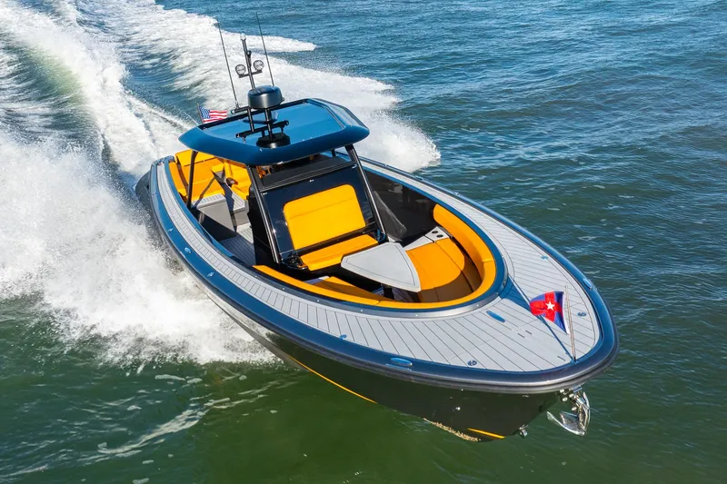 Slide: The Image of 2025 Wajer 38s luxury boat cruising on open water. - 30