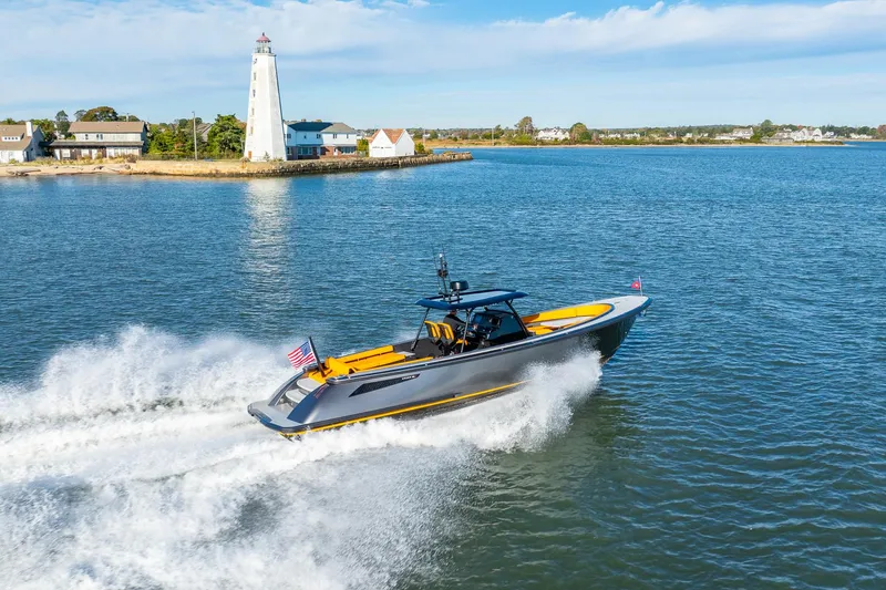 Slide: The Image of Wajer 38s 2025 yacht cruising near a lighthouse on a sunny day. - 31