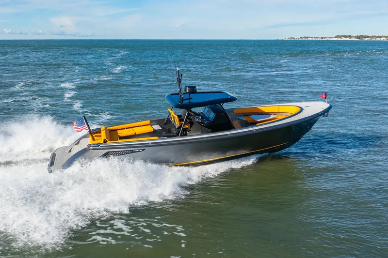Slide: The Image of 2025 Wajer 38s luxury boat cruising on open water. - 34