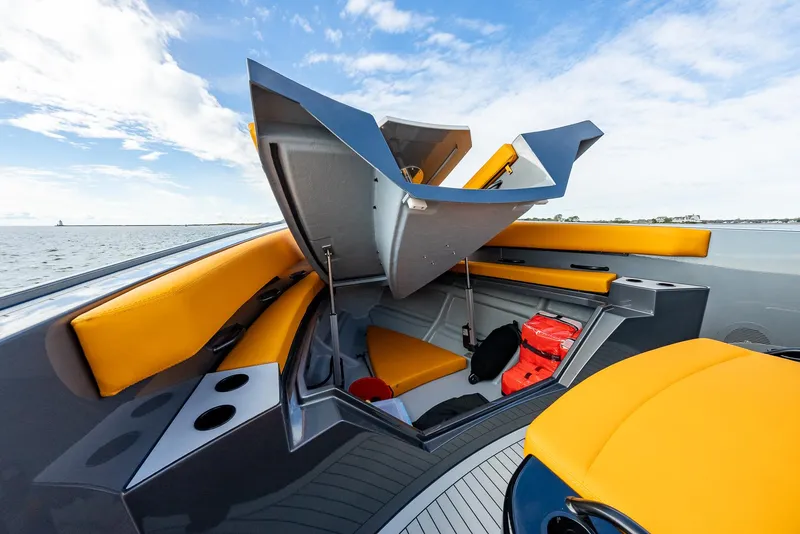 Slide: The Image of 2025 Wajer 38s yacht with open storage compartment, featuring sleek design and vibrant yellow seating. - 7