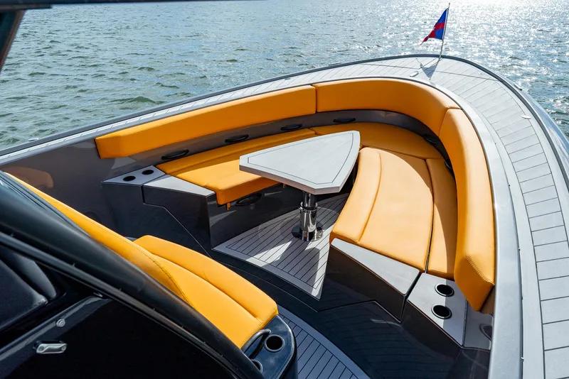 Slide: The Image of Luxurious 2025 Wajer 38s yacht with orange seating and sleek design on the water. - 9
