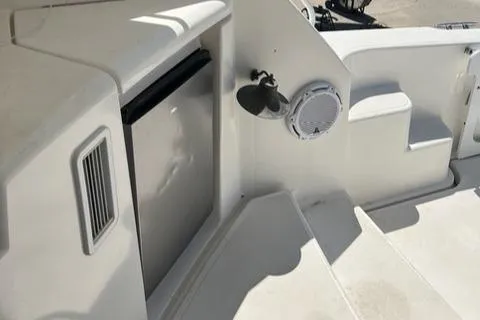 Slide: The Image of 2007 Tiara Yachts 4300 Sovran interior with steps, speaker, and mini fridge. - 11