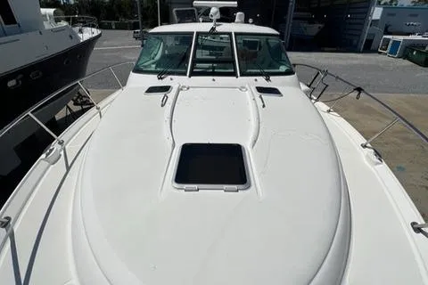 Slide: The Image of 2007 Tiara Yachts 4300 Sovran boat deck view in marina setting. - 14