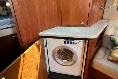 Slide: The Image of 2007 Tiara Yachts 4300 Sovran interior with built-in washing machine. - 20