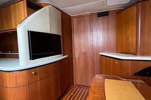 Slide: The Image of Interior of 2007 Tiara Yachts 4300 Sovran with wood cabinetry and modern design. - 23