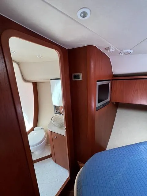 Slide: The Image of 2007 Tiara Yachts 4300 Sovran interior with bathroom and bedroom view. - 26