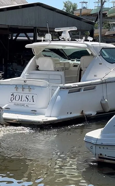 Slide: The Image of 2007 Tiara Yachts 4300 Sovran docked in marina, rear view. - 3