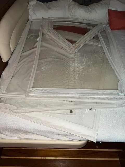 Slide: The Image of Boat window covers on bed, Tiara Yachts 4300 Sovran 2007 model. - 38