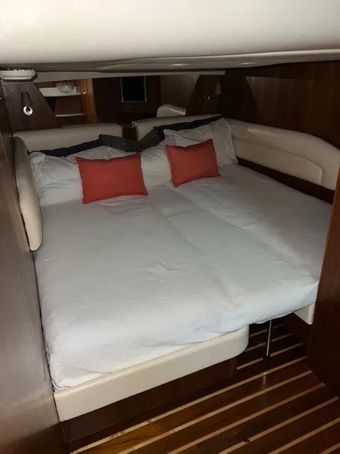 Slide: The Image of Luxurious cabin interior of 2007 Tiara Yachts 4300 Sovran with cozy bedding. - 39