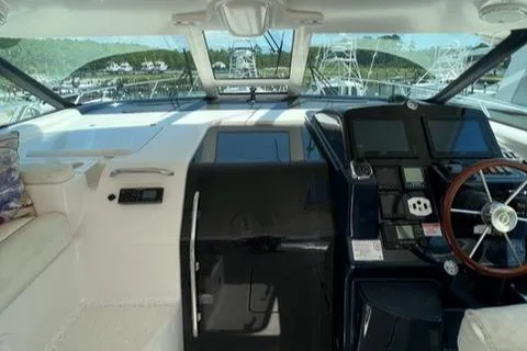 Slide: The Image of Interior cockpit of 2007 Tiara Yachts 4300 Sovran with modern navigation equipment. - 7