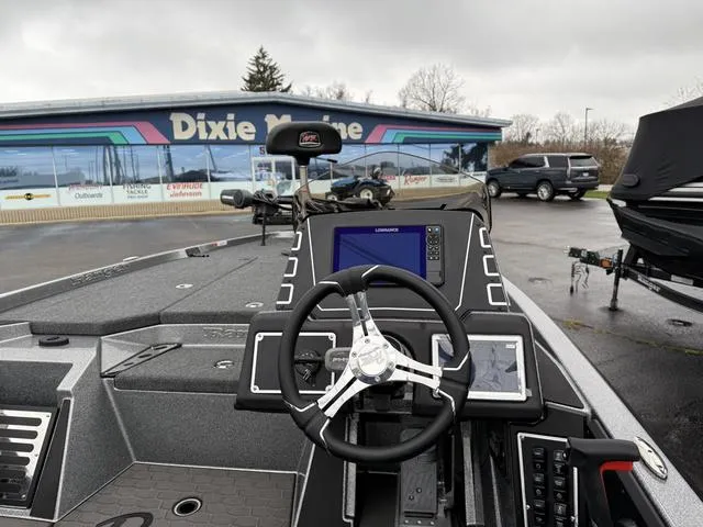 Slide: The Image of 2025 Ranger Z519R boat dashboard at Dixie Marine dealership. - 4