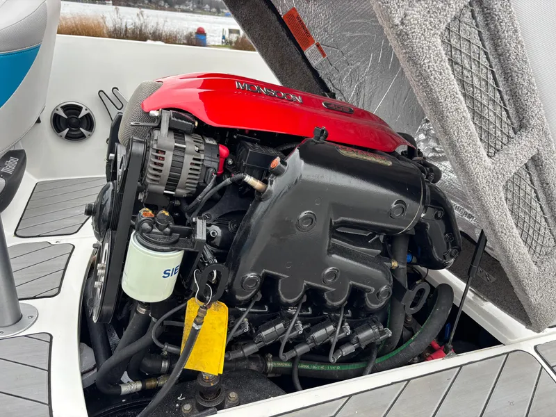 Slide: The Image of 2017 Malibu Response TXi Open Bow engine with red cover, detailed view. - 6