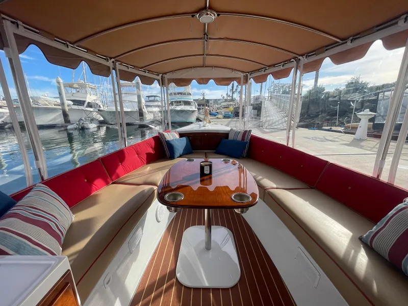 Slide: The Image of Luxurious interior of 2018 Duffy Bay Island 22 boat with elegant seating and table. - 14