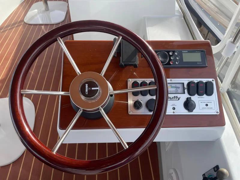 Slide: The Image of Steering wheel and control panel of 2018 Duffy Bay Island 22 boat. - 8