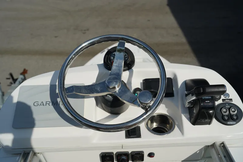 Slide: The Image of Steering console of 2015 Everglades 243 CC boat with Garmin navigation. - 20