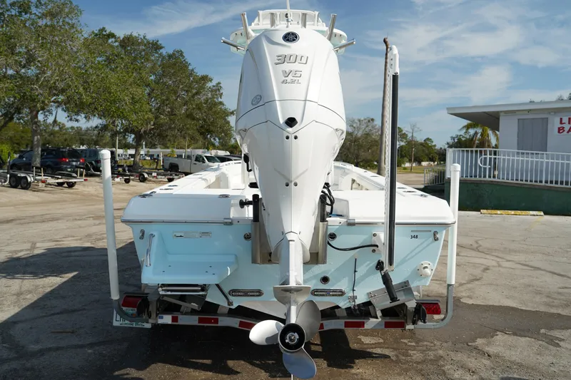 Slide: The Image of 2015 Everglades 243 CC boat with Yamaha 300 V6 engine, rear view. - 5