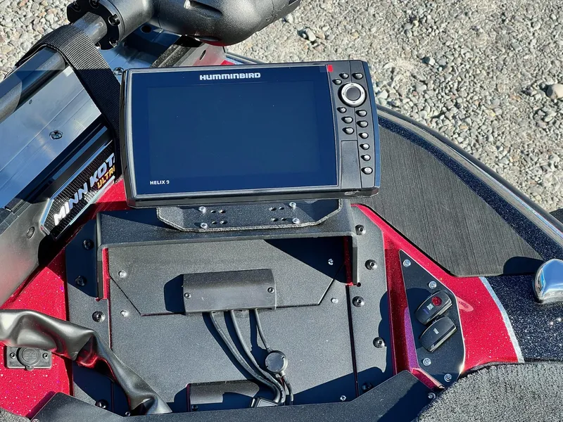 Slide: The Image of Humminbird Helix 9 fishfinder on 2025 Skeeter ZXR 21 boat dashboard. - 22