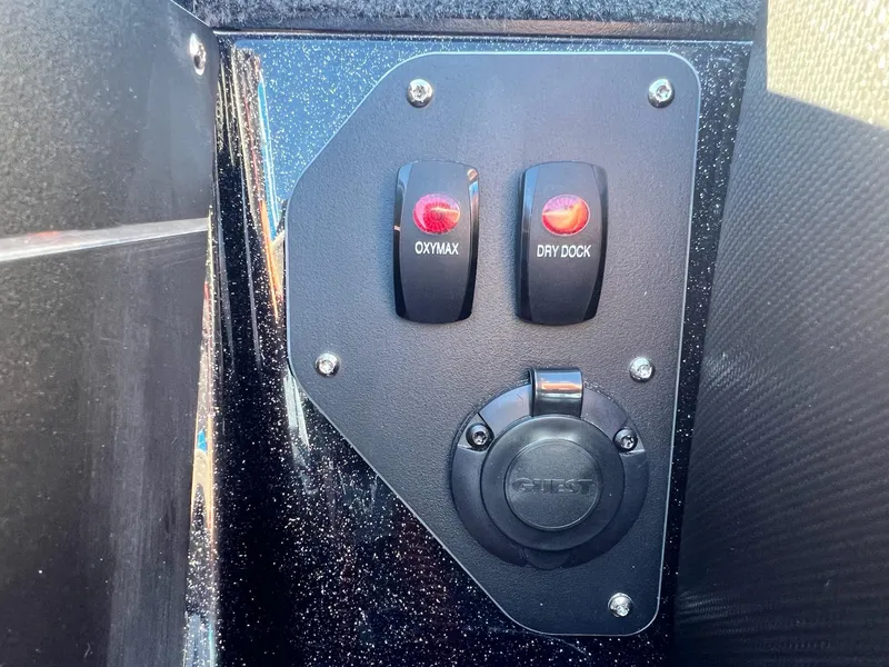 Slide: The Image of Control panel of 2025 Skeeter ZXR 21 boat with Oxymax and Dry Dock switches. - 25