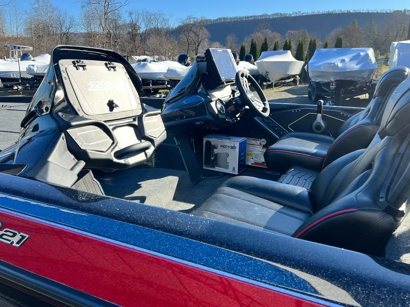 Slide: The Image of 2025 Skeeter ZXR 21 boat interior with modern seating and dashboard. - 3