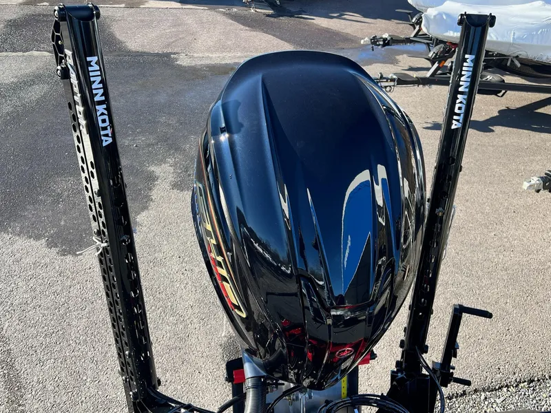 Slide: The Image of 2025 Skeeter ZXR 21 boat with Minn Kota Raptor anchors on a trailer. - 31