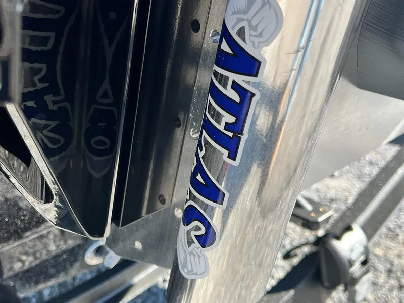 Slide: The Image of Close-up of Skeeter ZXR 21 boat detail with reflective surface, 2025 model. - 34