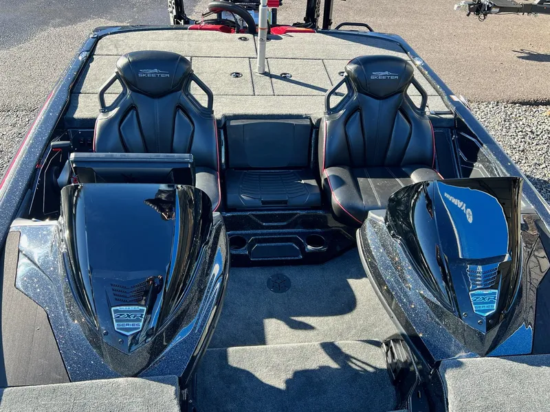Slide: The Image of 2025 Skeeter ZXR 21 boat interior with dual seats and Yamaha engines. - 8