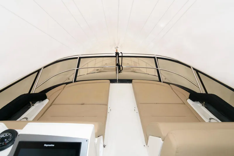 Slide: The Image of 2016 Sea Ray L590 Fly yacht with spacious deck and luxurious seating. - 16