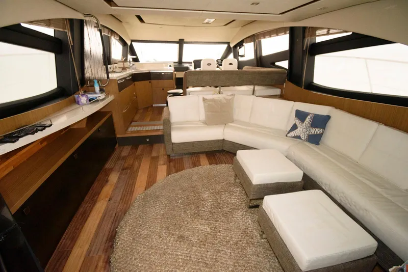 Slide: The Image of Luxurious interior of 2016 Sea Ray L590 Fly yacht with modern furnishings and elegant design. - 18