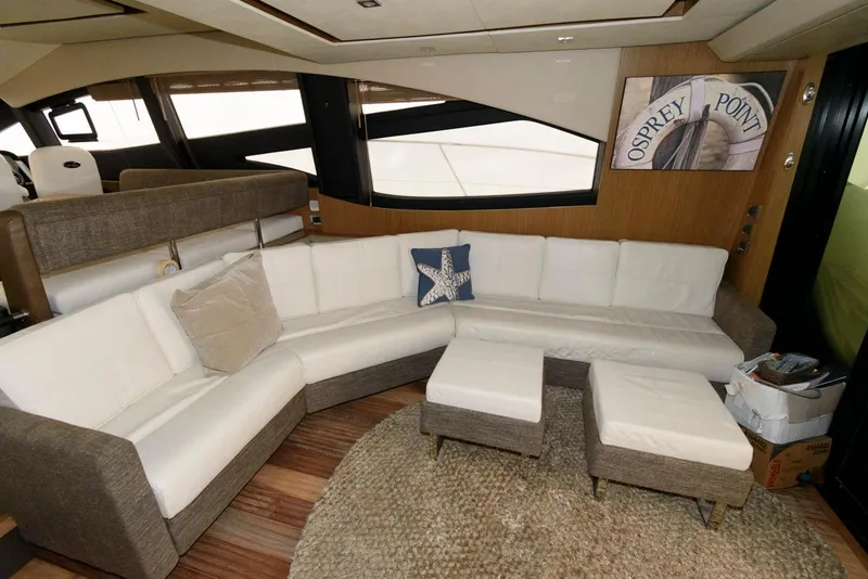 Slide: The Image of Luxurious interior of 2016 Sea Ray L590 Fly yacht with plush seating and stylish decor. - 19