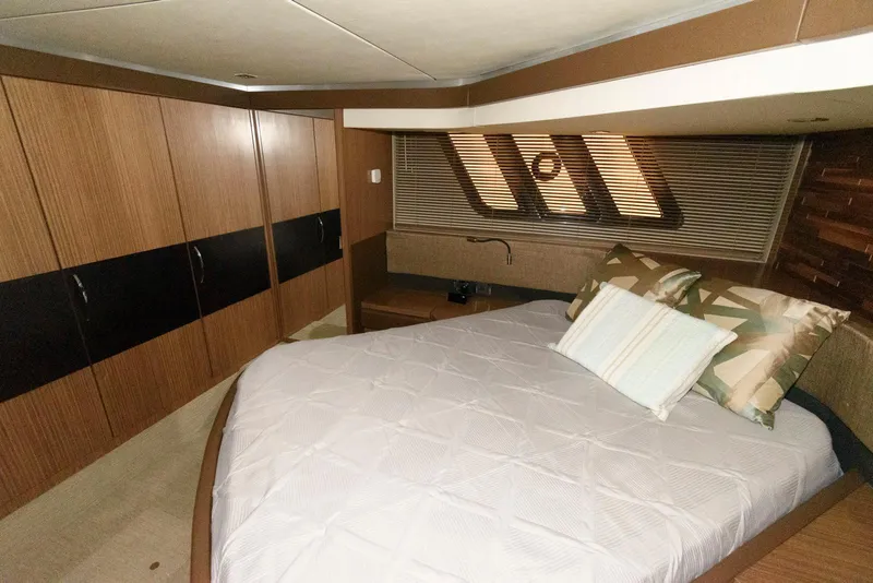 Slide: The Image of Luxurious bedroom interior of 2016 Sea Ray L590 Fly yacht. - 32
