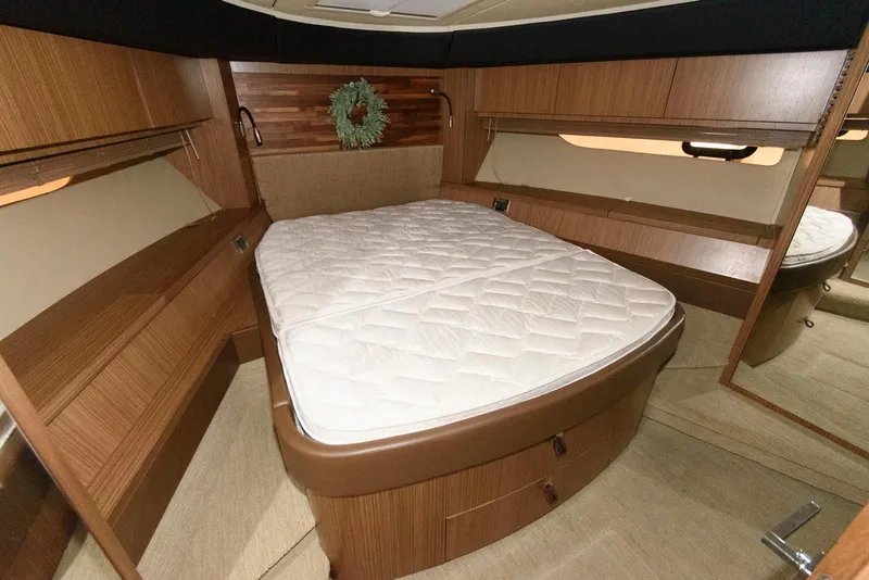 Slide: The Image of Luxurious bedroom interior of 2016 Sea Ray L590 Fly yacht. - 37