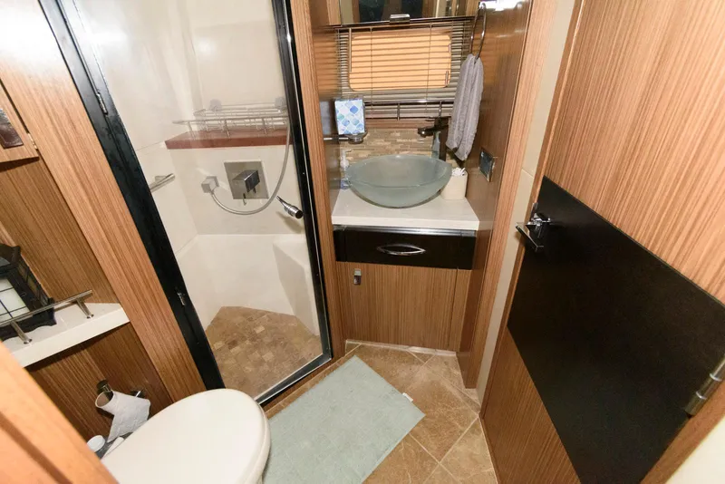 Slide: The Image of Luxurious bathroom in 2016 Sea Ray L590 Fly yacht with modern fixtures. - 40