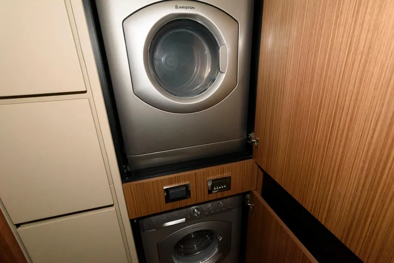 Slide: The Image of Stacked washer and dryer in 2016 Sea Ray L590 Fly yacht. - 41