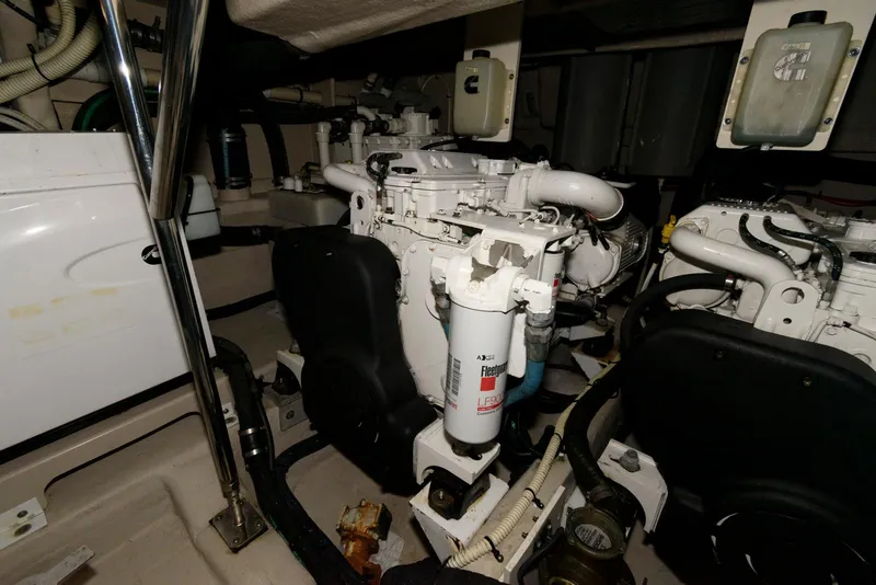 Slide: The Image of Engine room of 2016 Sea Ray L590 Fly yacht, showcasing mechanical components. - 44