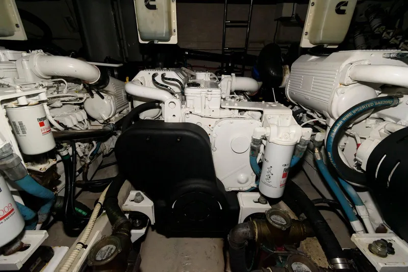 Slide: The Image of Engine room of 2016 Sea Ray L590 Fly yacht, showcasing mechanical components. - 45