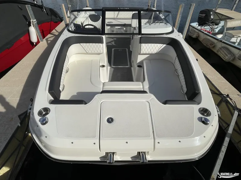 Slide: The Image of 2021 Bayliner DX 2250 boat interior with spacious seating and modern design. - 6