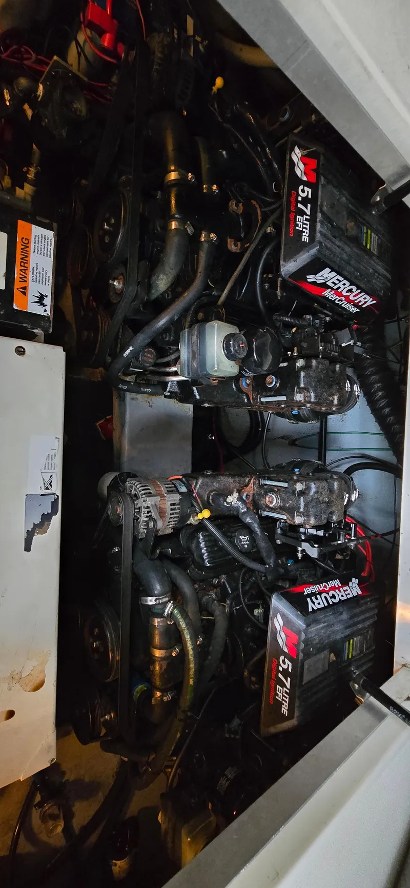 Slide: The Image of Engine compartment of 2002 Monterey 322 Cruiser with dual 5.7L MerCruiser engines. - 11