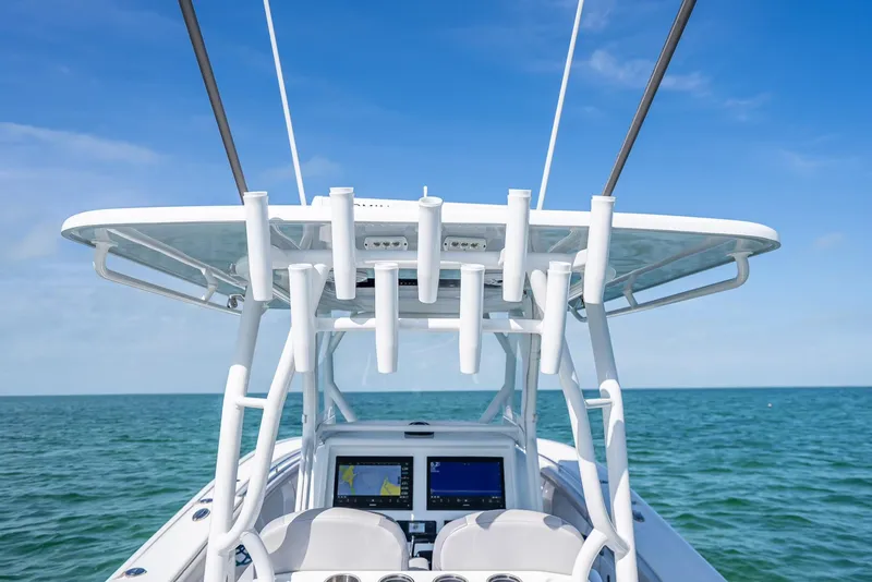 Slide: The Image of 2020 Yellowfin 34 boat dashboard with ocean view and clear blue sky. - 29
