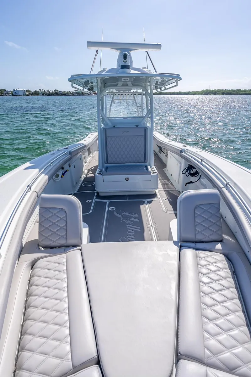 Slide: The Image of 2020 Yellowfin 34 boat on water, featuring sleek design and luxurious seating. - 45