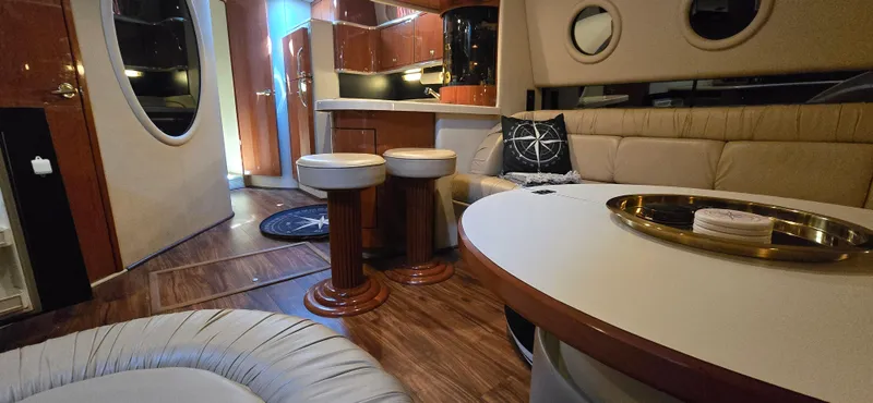 Slide: The Image of Luxurious interior of 1999 Sea Ray 50 Sundancer yacht with modern furnishings. - 11